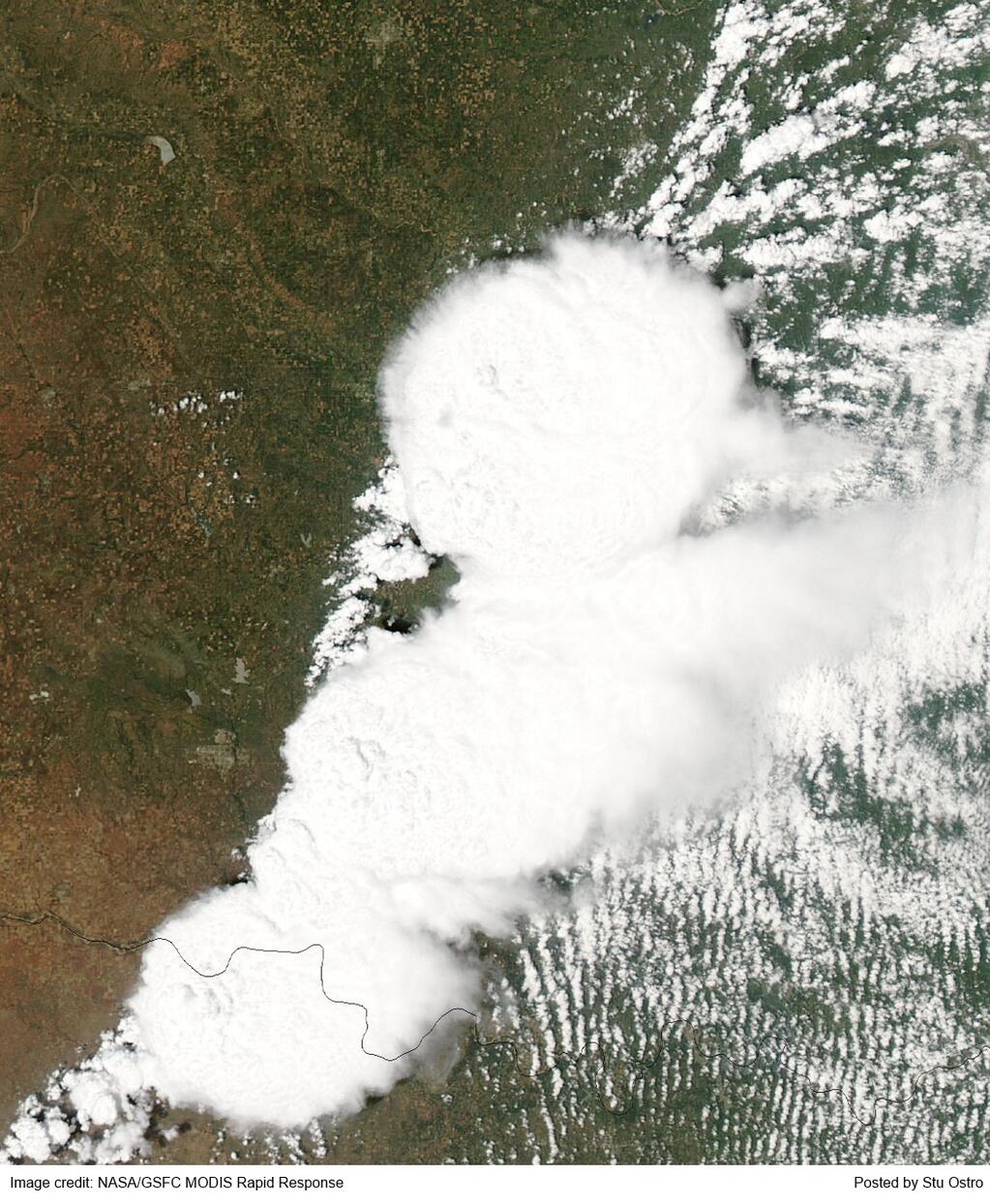 Hi-res satellite image of the thunderstorm cluster that produced the Moore, OK tornado. The tornado was in the top (north) of the cluster.
